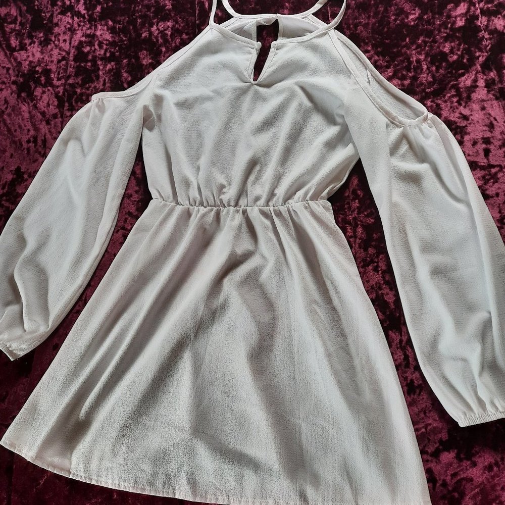 Dress. Cut out in the shoulders and cut out in the back